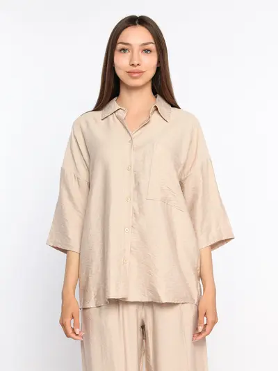 Блуза прямого кроя со скругленным нижним краем